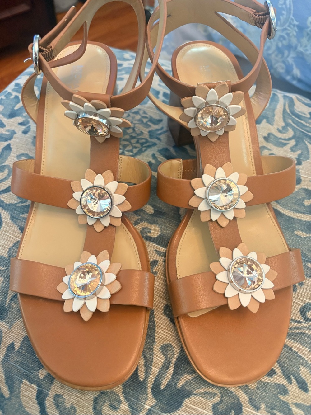 MICHAEL Michael Kors Tan T-Strap Sandals with White Floral Crystal Accents